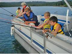 Fishing our lake on our 24’ Pontoon boat